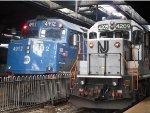 NJ Transit train 1211 and another NJ Transit train idle in Hoboken Terminal